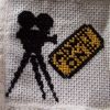 movie camera and ticket