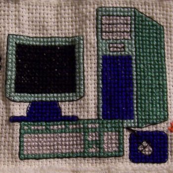 cross-stitched desktop computer