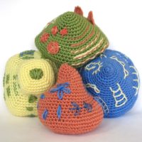 How to embroider on crocheted items, start to finish. A four-part tutorial series at revedreams.com/.