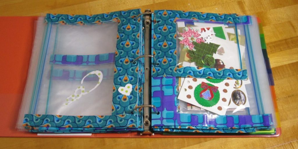 my new sticker storage: taped bags in a binder