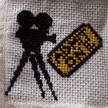 Movie Ticket and Camera