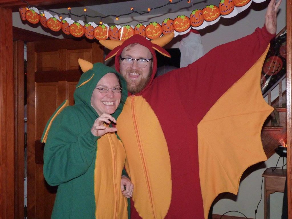 photo of the hubs and me in our dragon suits