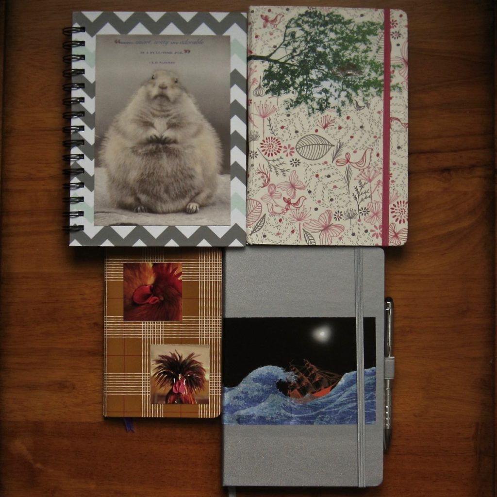 notebooks decorated with magazine cutouts and other paper, via mod podge