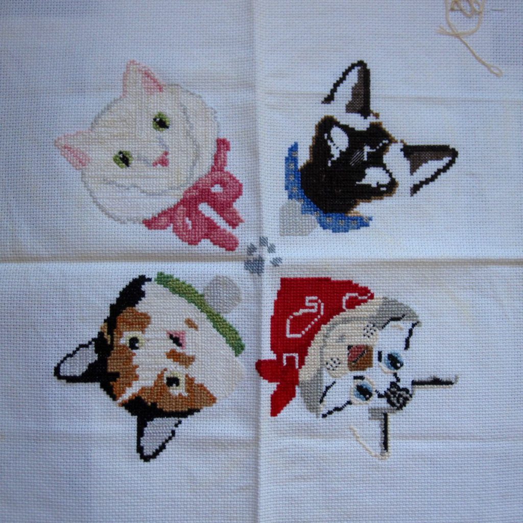 unfinished cat cross-stitch