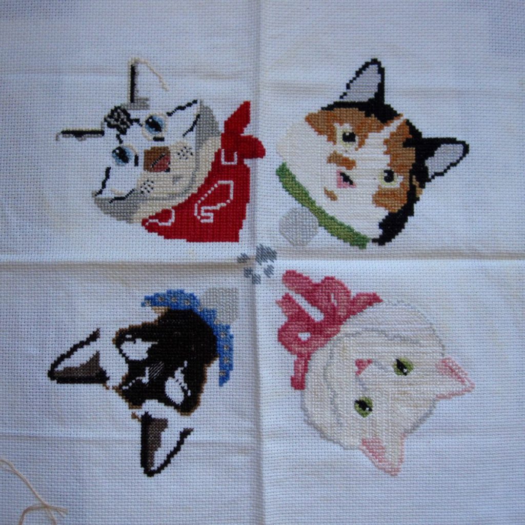 unfinished cat cross-stitch