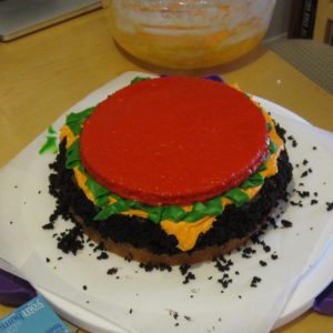 tomato slice on the cake/burger