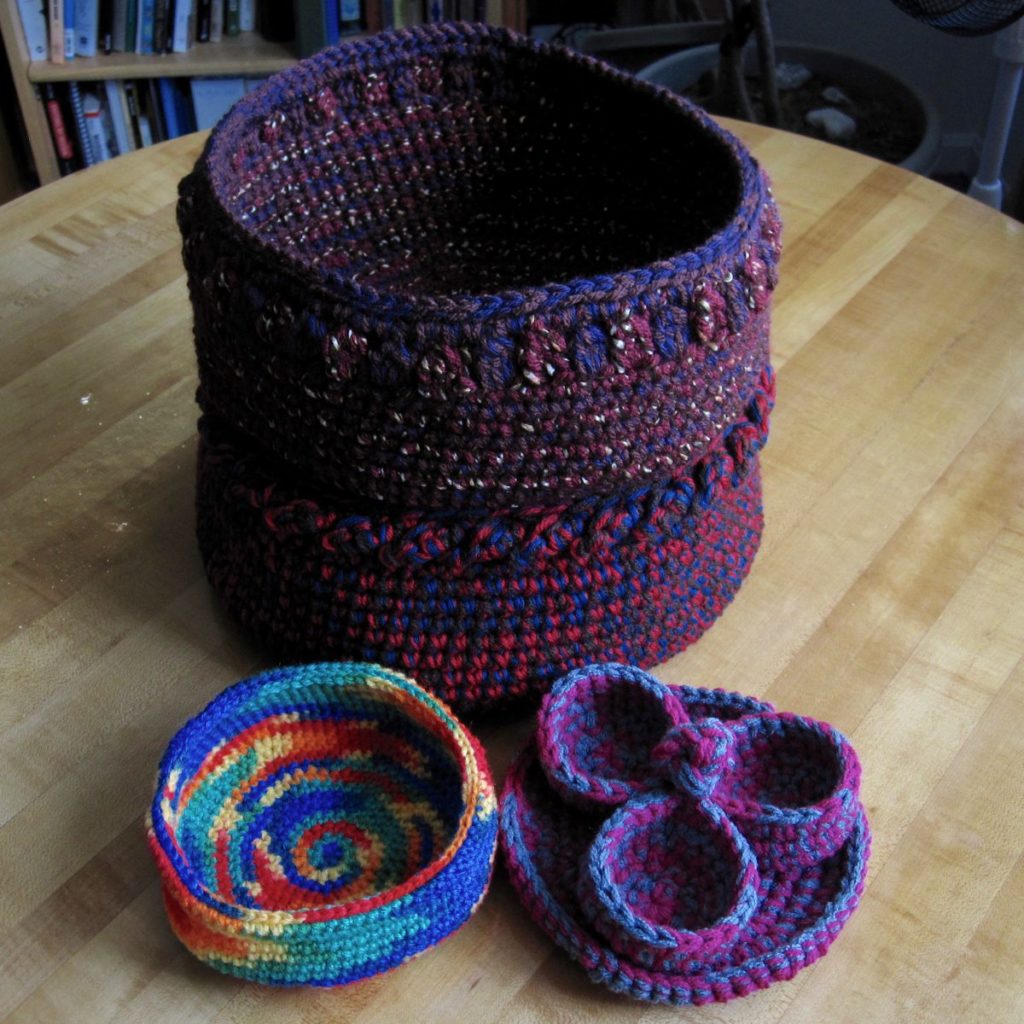 crochet baskets all together