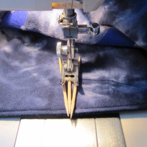machine-sewing a button: toothpicks only