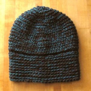 half double crochet hat layer on table