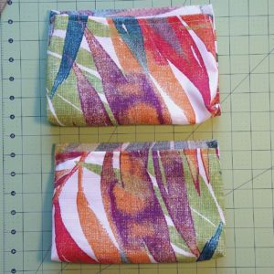 Pouches with hidden side hemmed at top