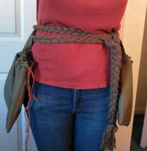 Braided belt as worn, with pouches hanging on the sides