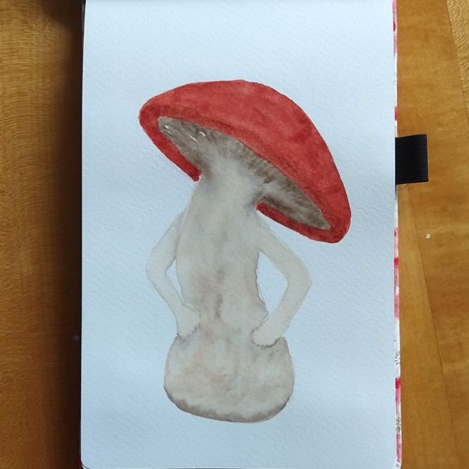 Mushroom with red cap and arms, posed like person with hands on hips