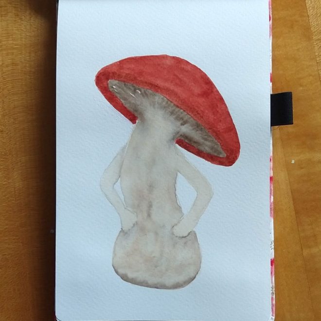 Mushroom with red cap and arms, posed like person with hands on hips