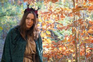 Me in wood elf costume with background of orange autumn leaves